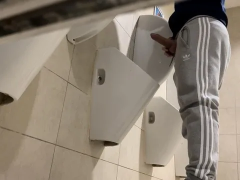 Ahead to as two straight guys get caught tugging in public rest room - it's a hot, moisture public cumshot!